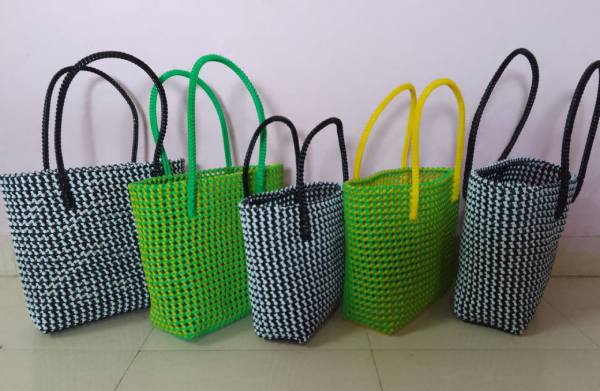 Handwoven wire bags in different colours